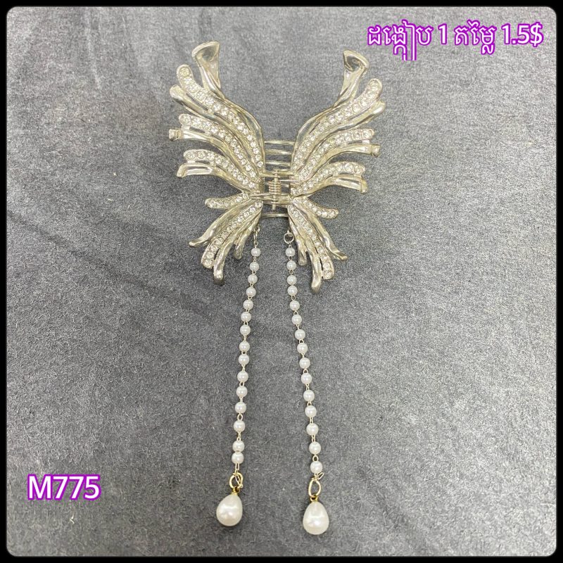 M775